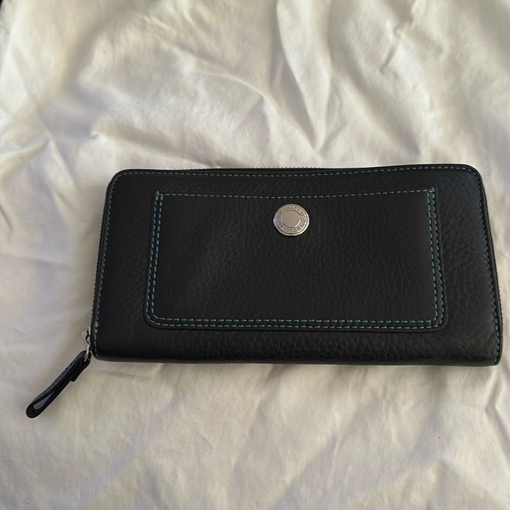 Coach wallet black pebble leather with leather interior.